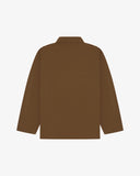 Back view of brown, buttoned organic cotton overshirt with view of reinforced elbow area and boxy silhouette.