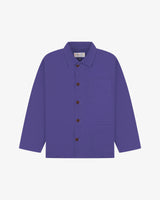 Front flat shot of purple, buttoned organic cotton overshirt. Clear view of chest and hip pockets, corozo buttons and simple, boxy shape.