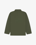 Back view of coriander-green, buttoned organic cotton overshirt with view of reinforced elbow area and boxy silhouette.