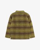 Back view of woodland green check, buttoned Pennine wool overshirt with view of reinforced elbow area and boxy silhouette.