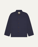 Front flat shot of midnight blue, buttoned organic cotton overshirt. Clear view of chest and hip pockets, corozo buttons and Uskees branding label.