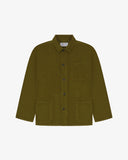 Front flat shot of woodland green, buttoned corduroy overshirt. Clear view of corozo buttons, 3 pockets and Uskees branding label.