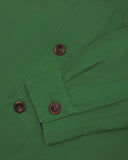 View of the mid-section and sleeve of the 3003 Uskees button-down work shirt in mint green with focus on cuff, placket and corozo buttons.