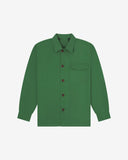 Mint green buttoned organic cotton workshirt from Uskees with clear view of chest pocket and utilitarian silhouette.