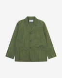 Full front view of coriander-green buttoned organic cotton-twill blazer with clear view of three patch pockets and Uskees branding label.