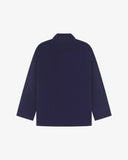 Flat back view of men's corduroy deep indigo blazer from Uskees with view of reinforced elbows.