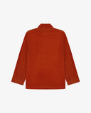 Flat back view of corduroy rust-red blazer from Uskees with view of reinforced elbows and indicating contemporary, boxy fit.
