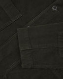 Close-up view of cuff, placket and corozo buttons of green-brown (seaweed) blazer from Uskees and providing a clearer view of the 11 wale organic corduroy.
