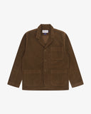 Front view of Uskees brown cord jacket showing the collar and 3 front pockets on a white background.
