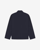 Flat back view of knitted organic cotton midnight blue blazer from Uskees with view of vent and reinforced elbows.