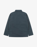 Back view of Uskees blueberry ripstop field jacket showing the modern military silhouette.