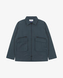 Front view of Uskees blueberry ripstop field jacket showing the chest zip pockets and gusseted pockets with flaps.