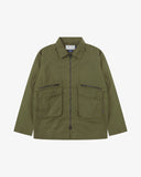 Front view of Uskees ivy green ripstop field jacket showing the chest zip pockets and gusseted pockets with flaps.