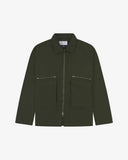 Front view of Uskees vine green drill field jacket showing the chest zip pockets and gusseted pockets with flaps.