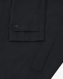 Uskees midnight blue car coat sleeve with focus on cuff and button.