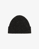 Front view of Uskees 4003 black Donegal wool hat with multicoloured speckles and showing the adjustable cuff.
