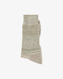 Folded Uskees 4006 highland sand organic cotton sock, showing bands of pale green, beige and white.