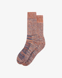 Flat view of Uskees 4006 volcanic orange organic cotton sock, showing bands of gold-orange, violet and beige.