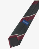 Close-up reverse view of recycled polyester repp tie, showing tricolour stripes, Uskees branding label and black lining.