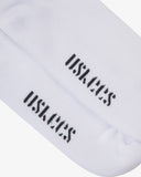 The sole of the 4015 white cotton socks with focus on the 'USKEES' branding