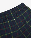 Uskees suburban blue/green check men's pyjama pants with focus on waistband, drawstring and button.