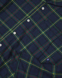 Uskees suburban blue/green plaid pajama top showing the buttons, cuff and check pattern.