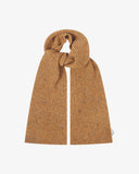 Donegal Merino wool scarf in speckled butterscotch, arranged in a knotted loop.