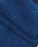 Close-up of the Donegal Merino wool scarf in speckled vivid ultra blue, showing the ribbed texture and speckled coloured neps.