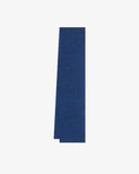 Neatly folded Donegal Merino wool scarf in a speckled vivid ultra blue colourway.