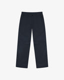Full-length front view of Uskees drill workwear pants in blueberry. Showing Corozo button fastening and tapered leg fit.