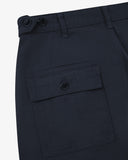 Close up back shot of Uskees 5005 drill workwear pants in blueberry with focus on back pocket, adjustable waistband secured with Corozo button and belt loops.