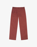 Full-length back view of Uskees 5005 drill workwear pants in chestnut-brown showing belt loops, back pockets (one with flap) and simple silhouette.