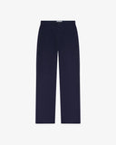 Front flat view of 5005 Uskees men's organic corduroy deep indigo workwear pants with view of YKK zip fly and contrasting Corozo buttons.