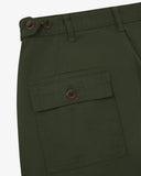 Close up back shot of Uskees 5005 drill workwear pants in vine green with focus on back pocket, adjustable waistband secured with Corozo button and belt loops.