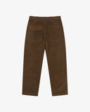 Back flat view of Uskees brown corduroy trousers showing the buttoned back pocket on a white background