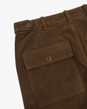 Close up view of Uskees brown corduroy trousers for men showing the waist adjusting button details  and the buttoned back pocket on a white background