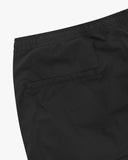 Close up view of the jetted back pocket and the waistband of the black ripstop pants from Uskees.