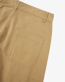 Close-up reverse view of Uskees khaki work pants with focus on right rear pocket, belt loops and cotton twill material.