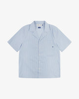 Front flat shot of Uskees blue, gold and white striped cuban shirt for men. Clear view of corozo buttons, chest pocket and Uskees branding label.