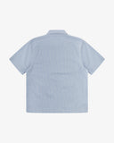 Reverse flat view of blue, gold and white striped cotton fabric short sleeve shirt from Uskees showing relaxed silhouette.