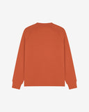 Back view of men's cinnamon-orange organic heavyweight cotton 7005 jersey sweatshirt by Uskees, showing ribbed cuffs and hem.