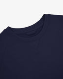 Close-up view of crew neck collar with decorative v-insert on Uskees deep indigo heavyweight cotton jersey sweatshirt.