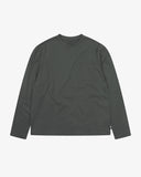 Full flat view of the Uskees dark green organic cotton long-sleeve T-shirt for men, showing the breast pocket and mini branding label on the seam. 