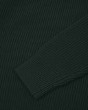 Close up view of Uskees dark green ribbed crew neck sweater for men showing sleeve and cuff detail.