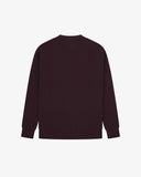 Back flat view of an Uskees dark red crew knit men's jumper.