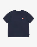 Front flat shot of Uskees navy blue t-shirt for men with a small red and white flag logo on a white background