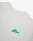 Neckline close-up of white organic cotton T-shirt, with focus on the neck tape reinforcement and green brand graphics.